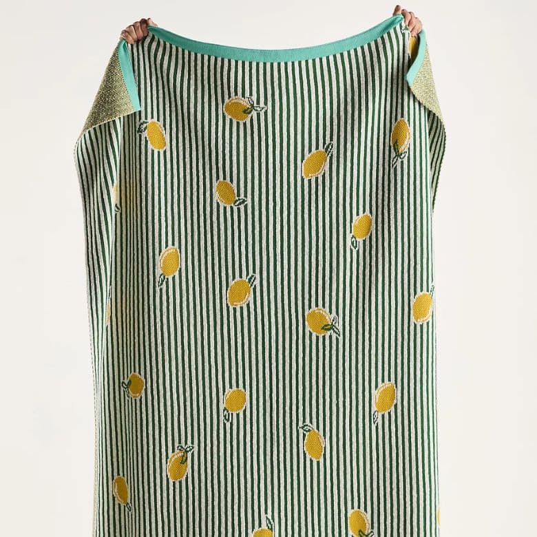 green striped throw blanket with lemons