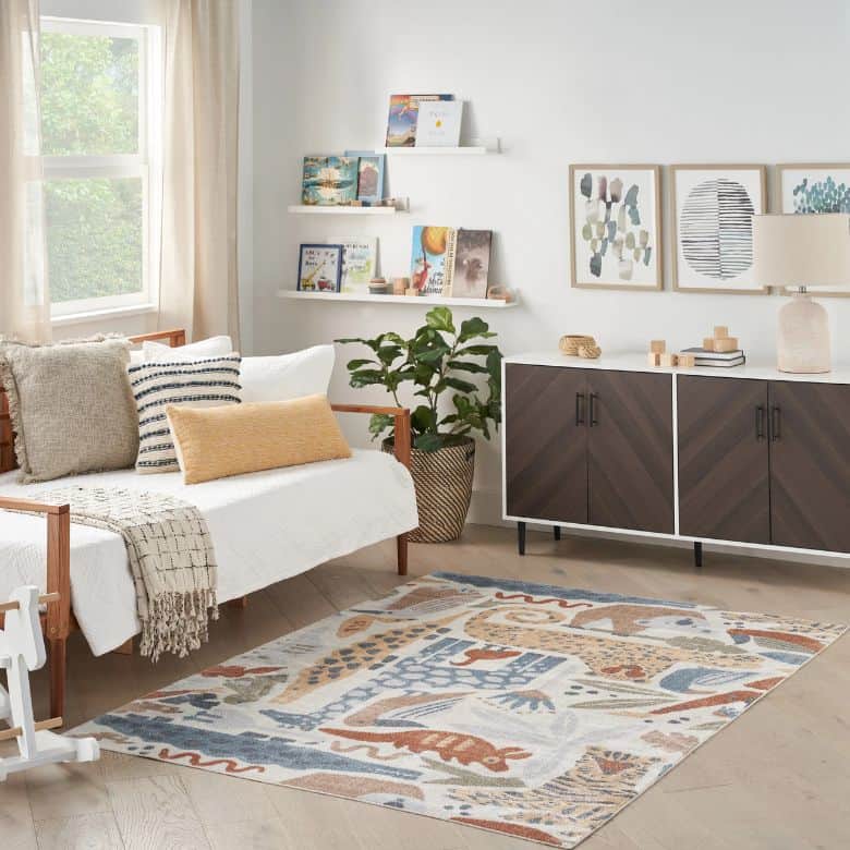 mulit-colored area rug featuring whimsical group of animals
