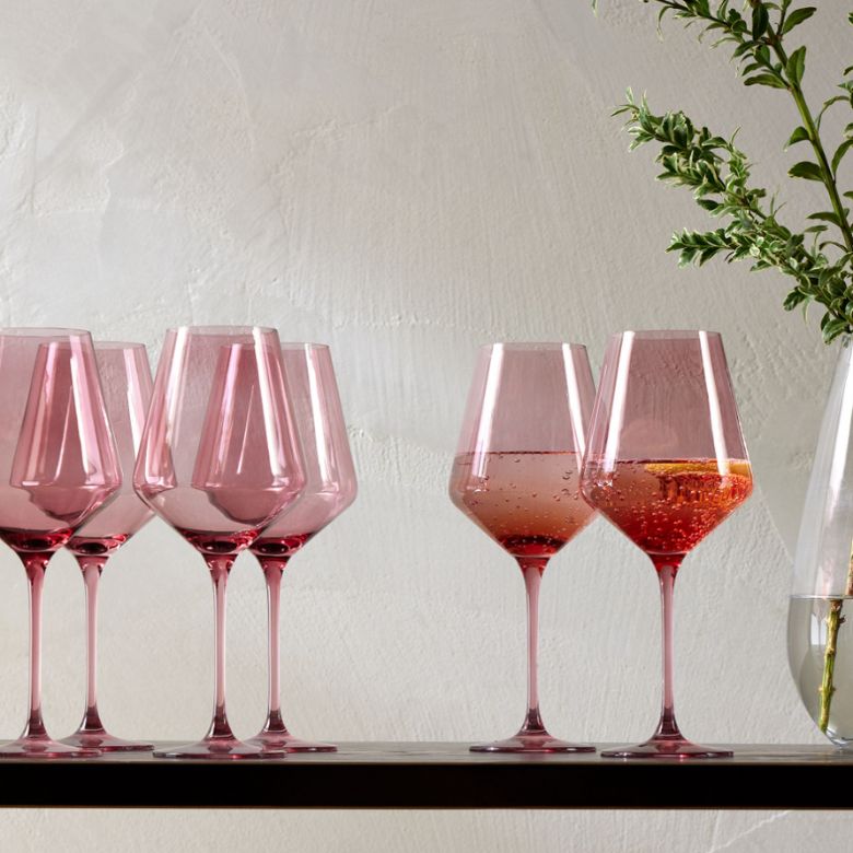 rose colored stemmed wine glasses