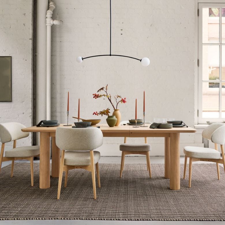 8-person blonde wood dining table
