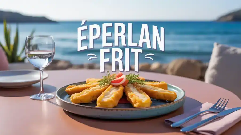 Assiette d'éperlan frit doré croustillant sur table en bord de mer
