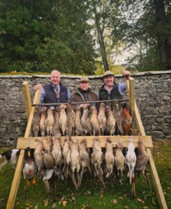 Traditional Scottish pheasant shoot at Erchless Castle Estate, Highland hunting experience.