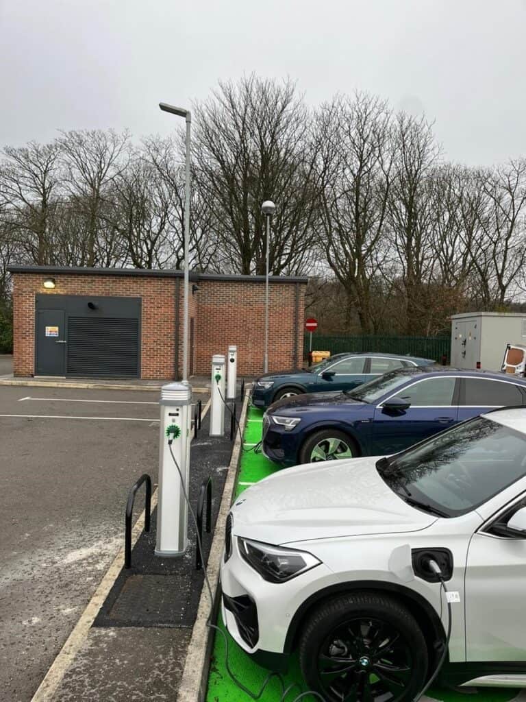 EV charging point for hospital staff and visitors, supporting sustainable transportation.
