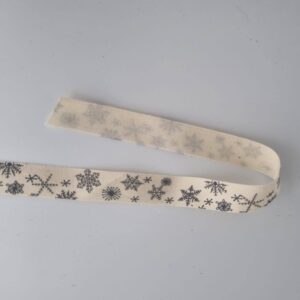 Grey Snowflakes on Beige - 25mm - per 1/2 metre