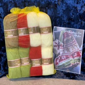 Brightly coloured double knitting yarns in red, yellow, green, and beige, packaged in a yellow mesh bag for easy viewing and selection.