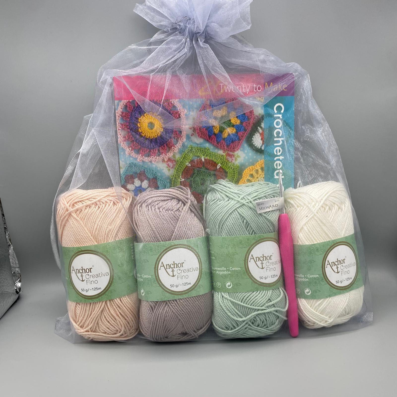 Bright pastel-coloured embroidery threads with crochet kit for crafting, displayed in a clear gift bag for sewing and needlework enthusiasts.