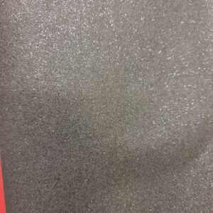 Luxurious champagne-coloured glitter fabric perfect for elegant clothing and special event decorations.