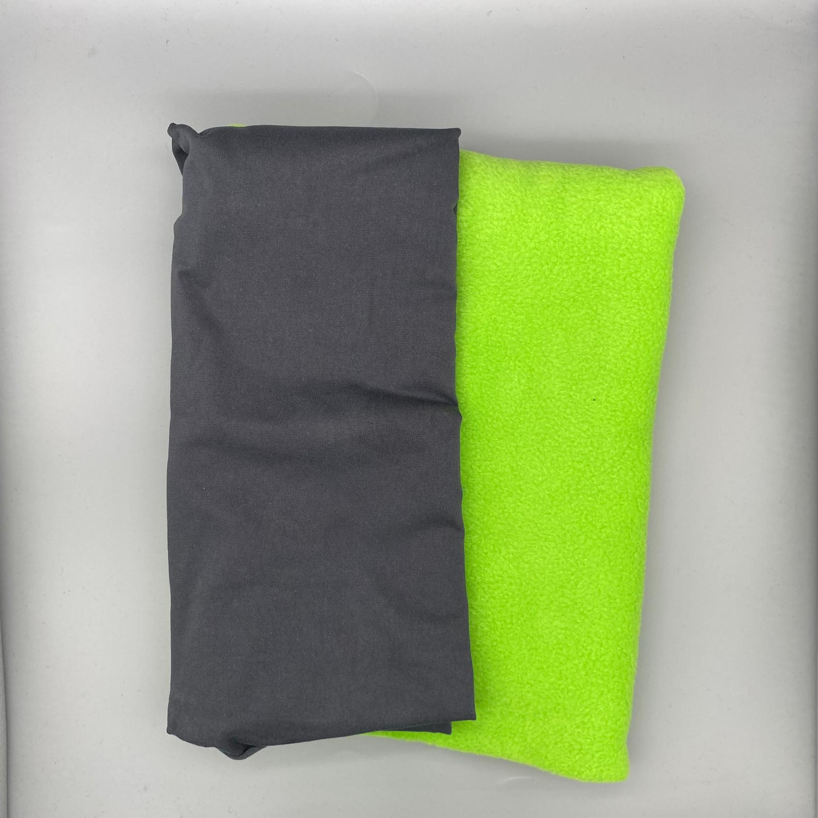 Navy blue and bright neon yellow fabrics folded together, suitable for dressmaking, upholstery, or crafting projects. The fabrics are from Fabric & Finery, known for high-quality textiles and sewing supplies.