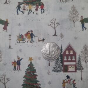 Festive Christmas-themed fabric with illustrations of families, snowmen, decorated Christmas trees, and winter scenery, ideal for holiday crafting and sewing projects.