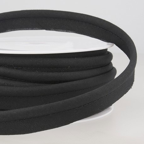Black elastic binding coil for sewing crafts, durable and high quality.