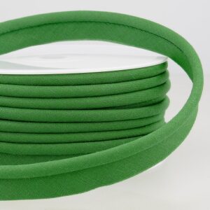 Green stretch piping for upholstery and dressmaking from Fabric & Finery UK, perfect for adding a professional finish to sewing projects.