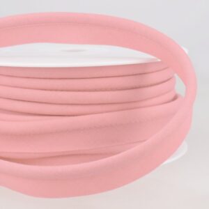 Pink bias binding for sewing and tailoring applications, high-quality finish.