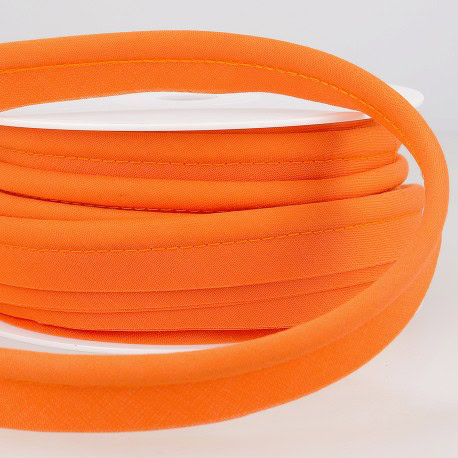 Bright orange elastic trim for fabric and clothing projects, ideal for tailoring, sewing, and craft designs. High-quality, versatile elastic perfect for custom apparel and DIY fashion accessories.