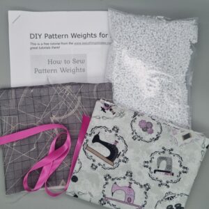 Pyramid Pattern weights x 4 - with instructions - Vintage sewing machine and sewing patterns on grey