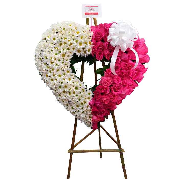 arreglo floral funerario en Cali