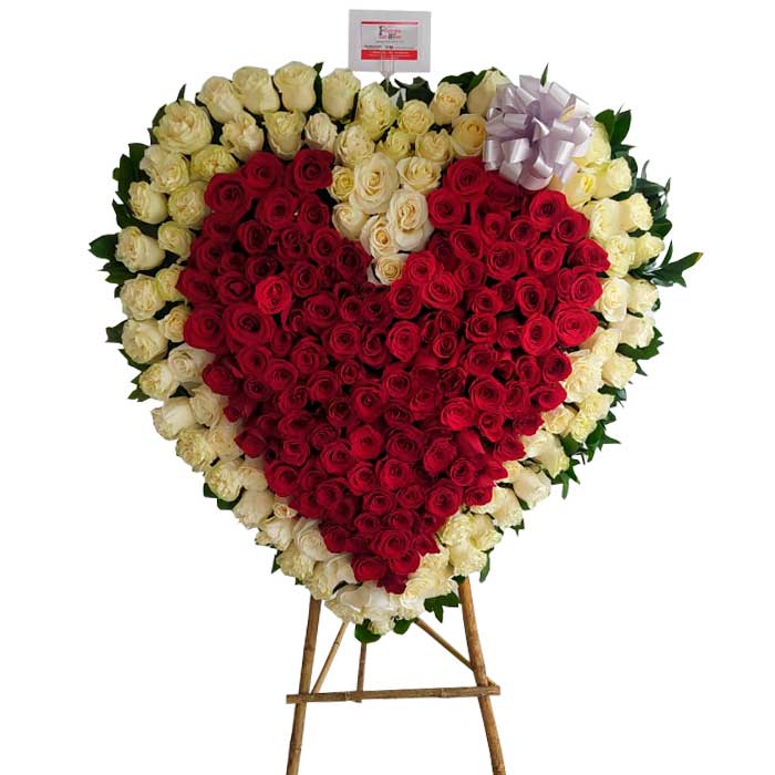 arreglo floral funerario en Cali