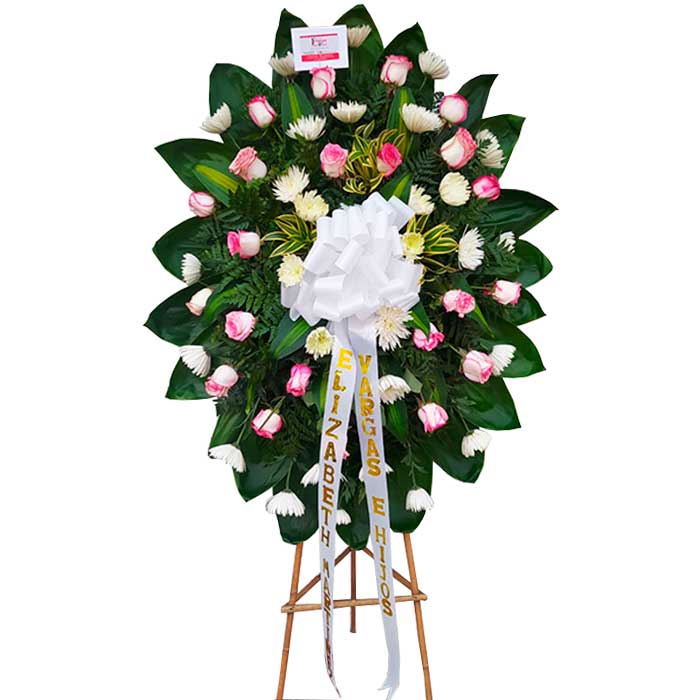 arreglo floral funerario en Cali
