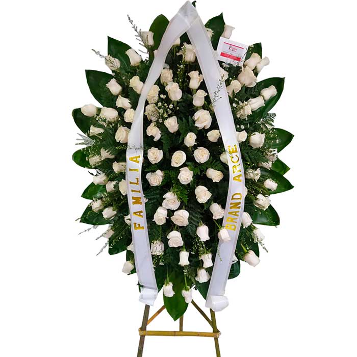 arreglo floral funerario en Cali