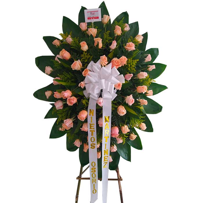 arreglo floral funerario en Cali