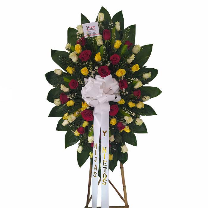 arreglo floral funerario en Cali