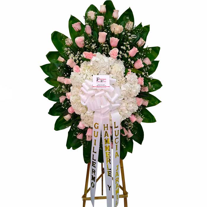 arreglo floral funerario en Cali