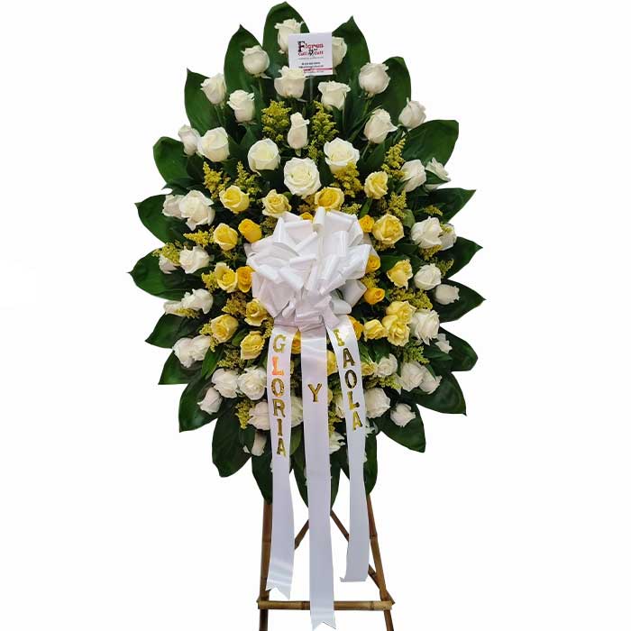 corona-funebre-rosas-blancas-con-amarilloFloristeria-en-cali