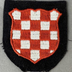 Croatian coat of arms embroidered patch with red and white checkered shield.