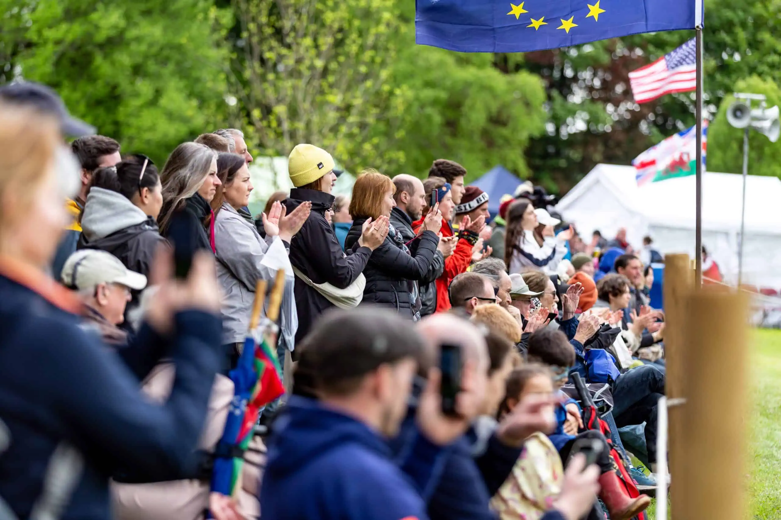 Spectators applauding at the Gordon Castle Highland Games in Moray, Scotland