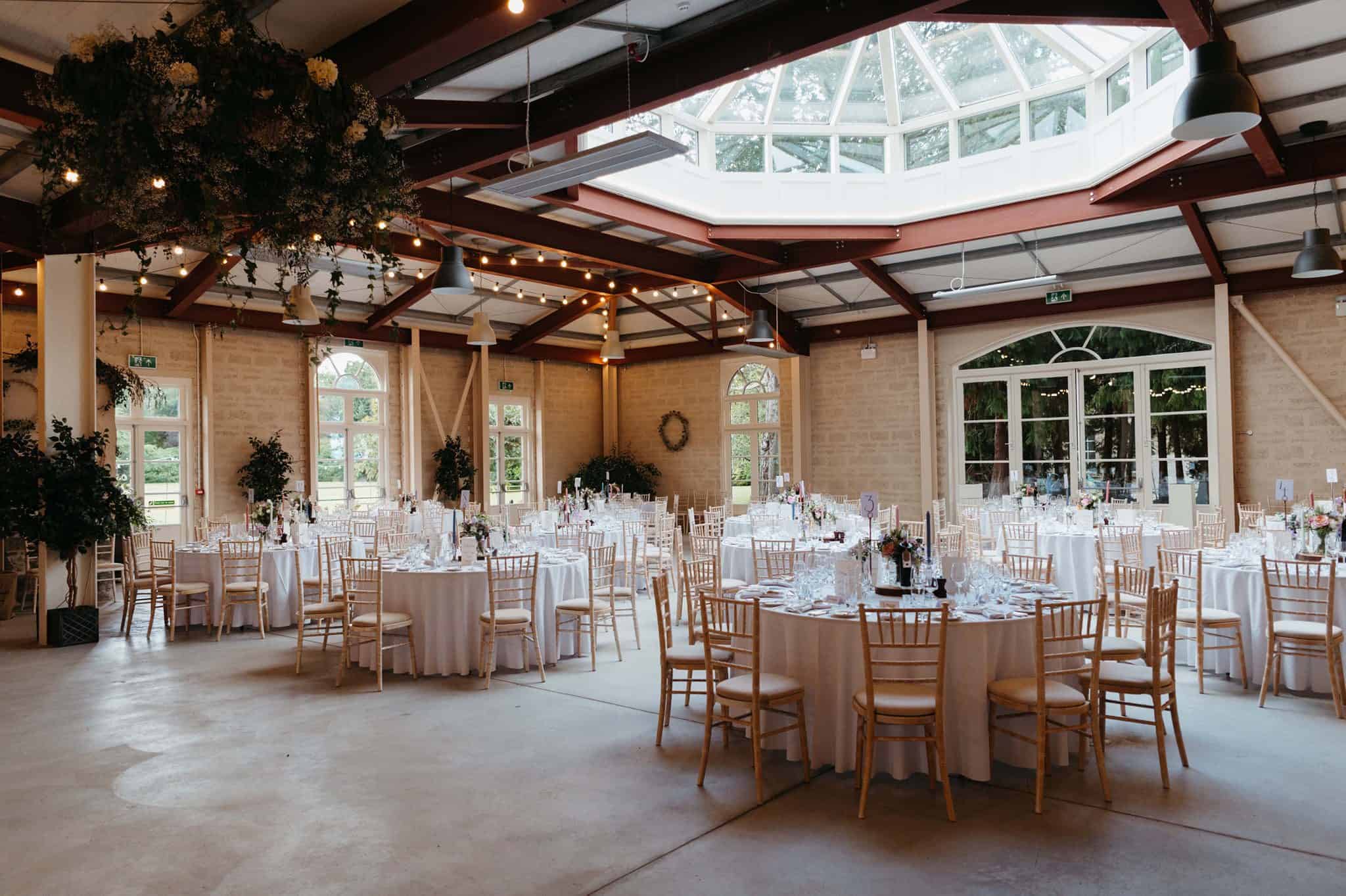 Elegant round table wedding reception in Octagonal Hall