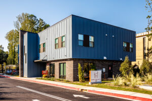 Modern multi-family residential building by Gorman & Company in the USA, showcasing innovative apartment design.