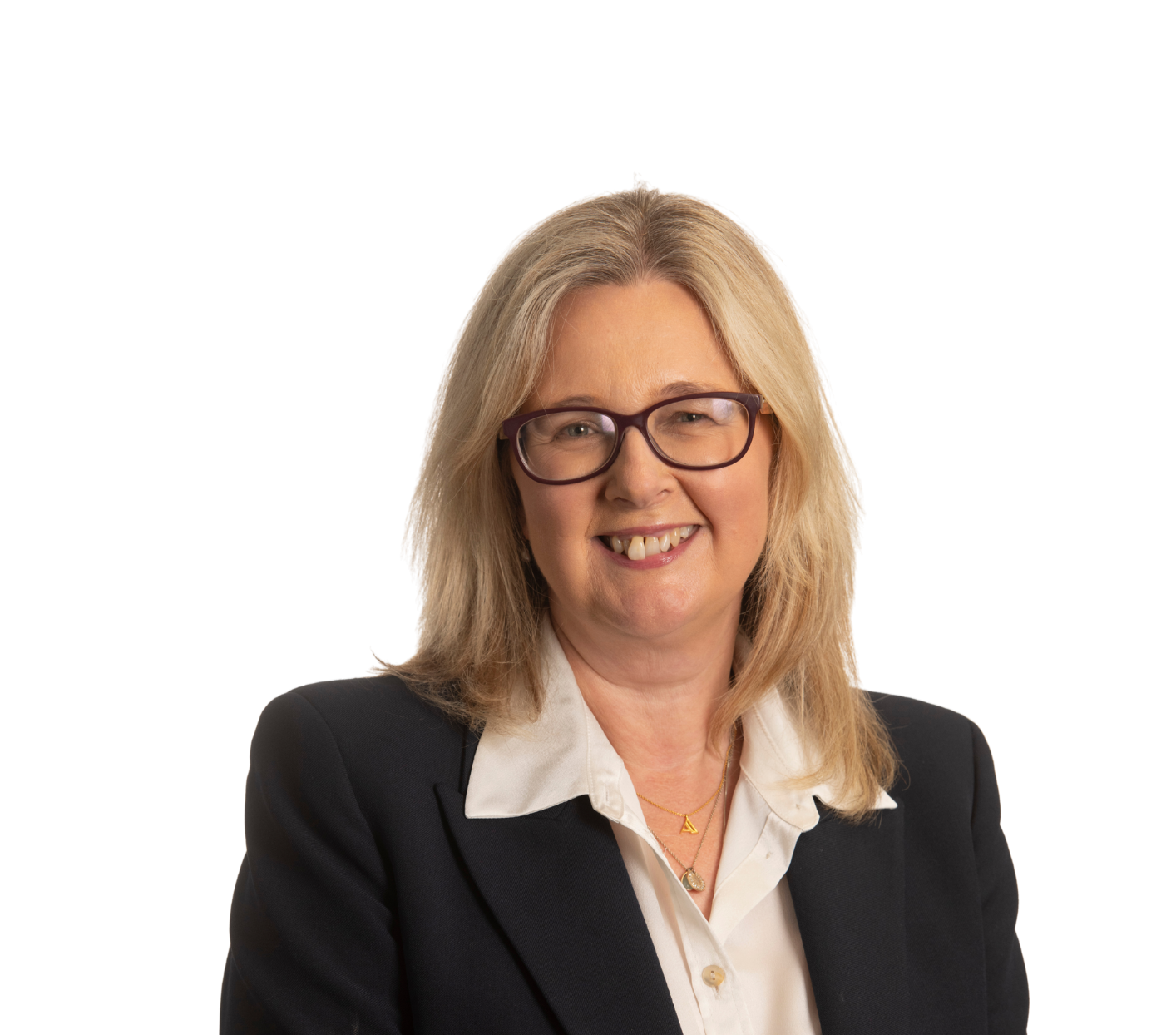 Businesswoman smiling in professional attire at Gorvins office, showcasing confidence and approachability in a corporate environment.