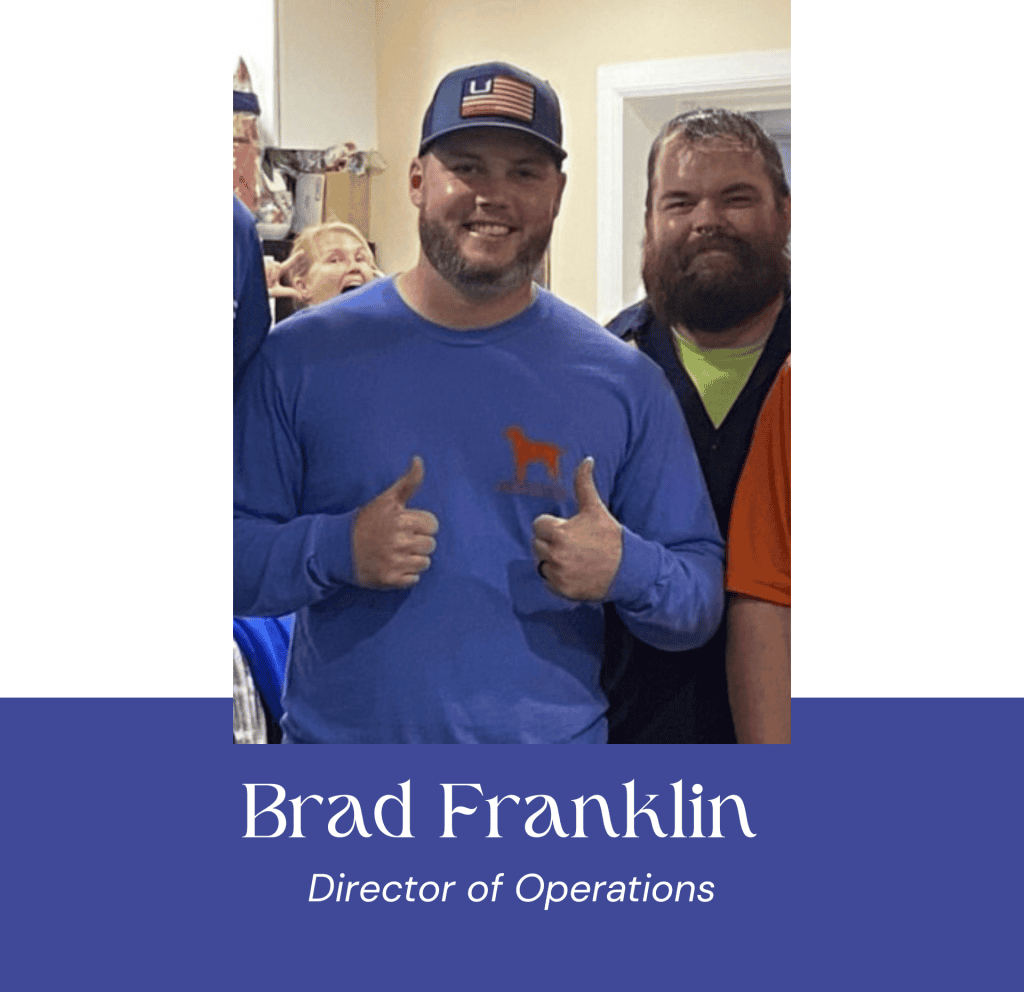 Brad Franklin, Director of Operations, smiling and giving thumbs up at VannGo event.