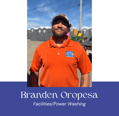 Branden Oropesa in orange uniform at VannGo site, facilities and power washing.
