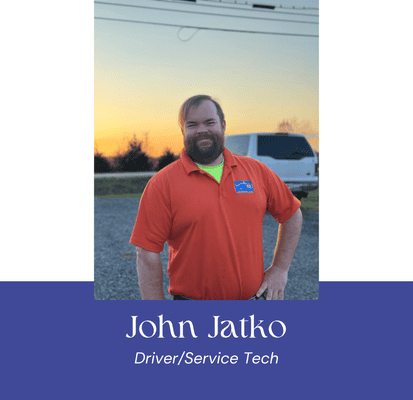 John Jatko, driver and service tech at VannGo Site Services, smiling outdoors at sunset.