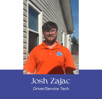 Profile of Josh Zajac, VannGo driver and service technician in orange uniform.