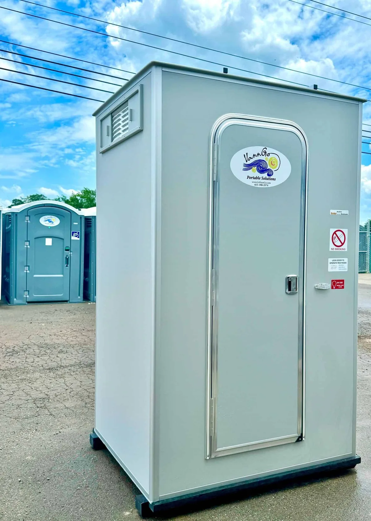 VannGo climate-controlled VIP restroom pod with the company logo on the door
