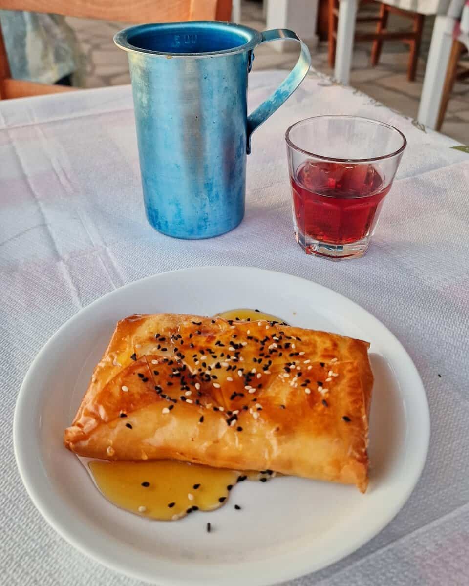 Baked cheese and honey starter with red wine at Iliovasilema Restaurant Donousa