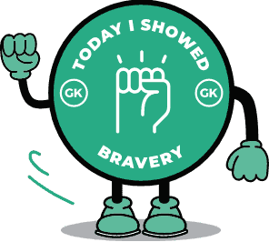 Fist raised in a circular badge graphic with "Today I Showed Bravery" and "GK" symbols, celebrating courage and confidence in a fun, motivational design.
