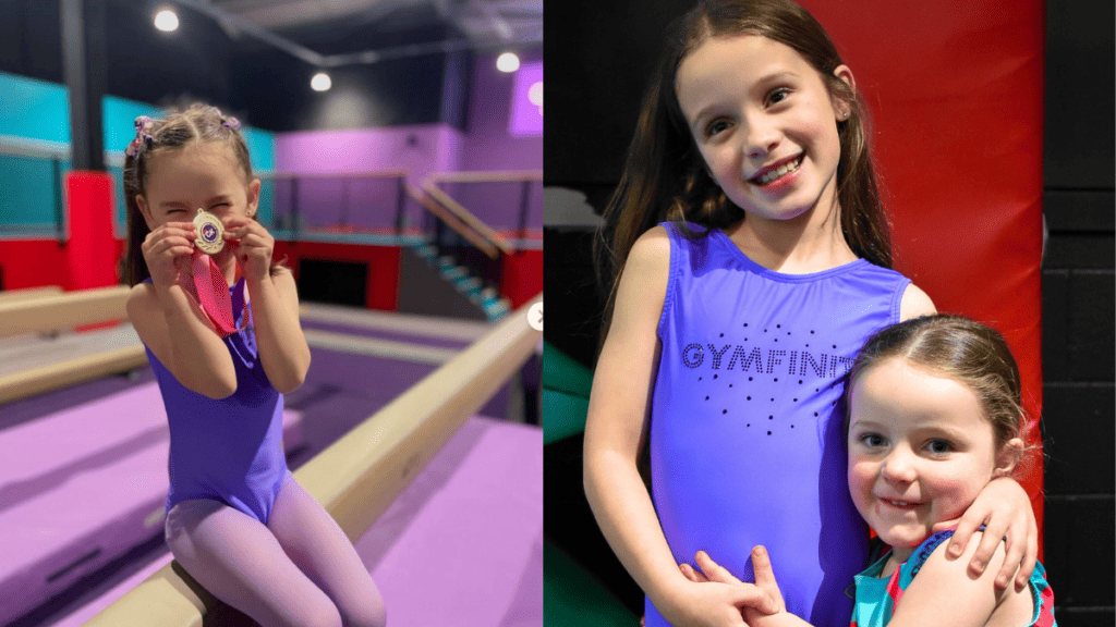 Medal-winning young gymnast holding her medal at gymnastics training centre, displaying joy and achievement, kids in gymnastic leotards in indoor gym environment, celebrating success and sporting excellence.