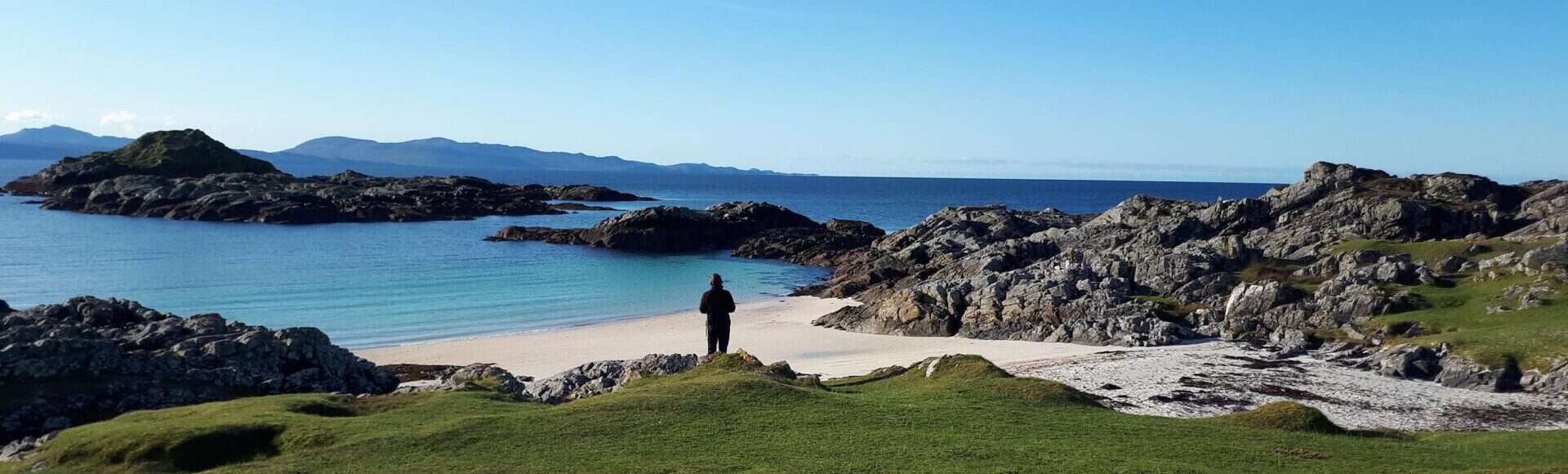 https://www.hebrideanadventures.co.uk/wp-content/uploads/2024/06/Skye-with-sandy-beach-scaled.jpg