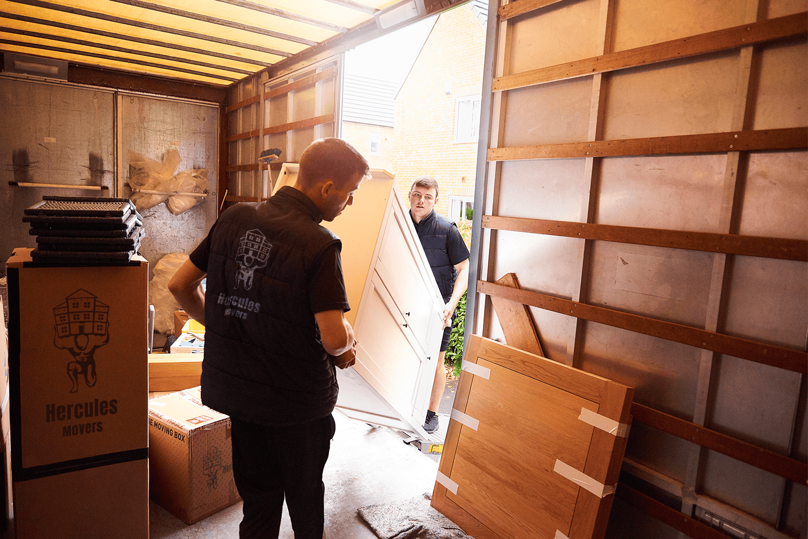 moving out cabinet with boxes