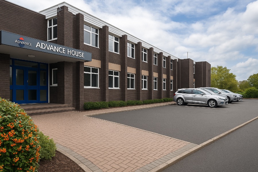 Commercial office building with parking lot and signage for Halesowen Gas Services.