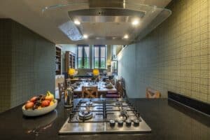 Highland Club Scotland kitchen interior with contemporary design and large windows.