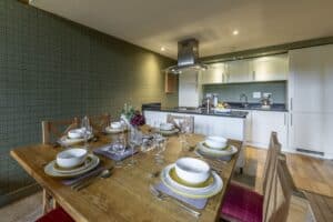 Contemporary kitchen and dining space at Highland Club Scotland.