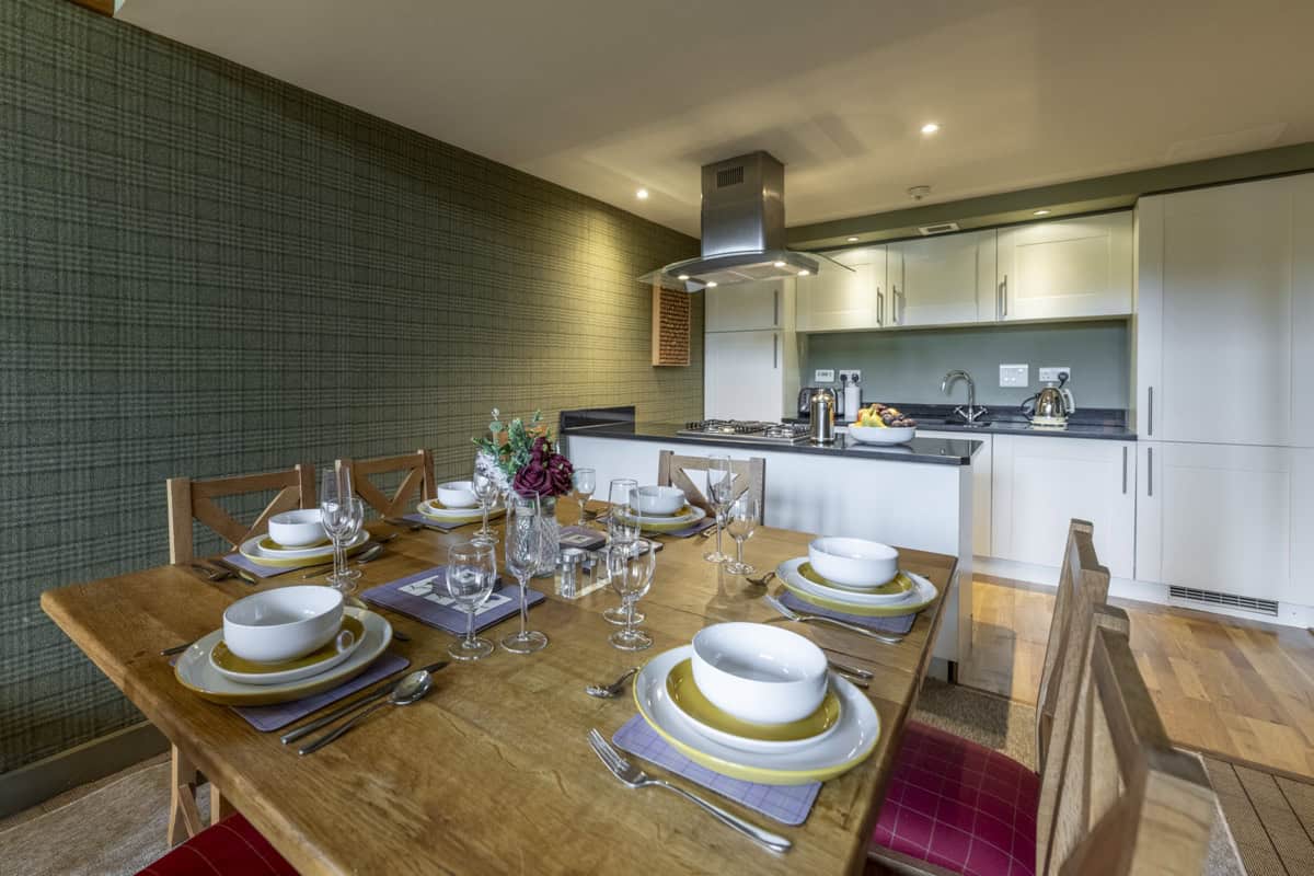 Contemporary kitchen and dining space at Highland Club Scotland.