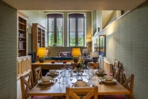Elegant Highland Club dining room with large windows and stylish decor.