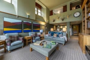 Comfortable Highland Club lounge with stylish decor and cozy seating.