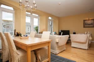 Highland Club Scotland interior with spacious living area and large windows.