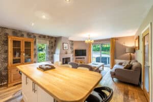 Highland Club Scotland living room with spacious seating and natural light.