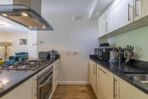 Modern kitchen interior at HCS Development, Highland Club Scotland.